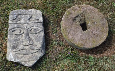 Lot 550 - Stone mill wheel and Inca style garden ornament