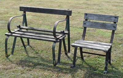 Lot 546 - Two wooden slatted garden chairs