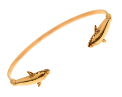 Lot 129 - Italian yellow metal dolphin bangle