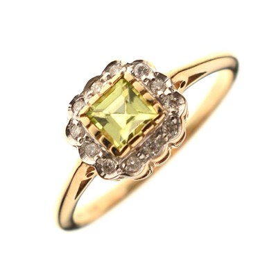 Lot 42 - Peridot and diamond 9ct gold cluster ring