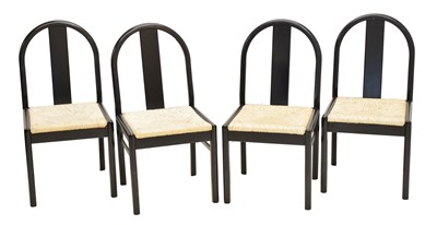 Lot 600 - Four Habitat rush-seated ebonised chairs