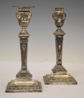 Lot 217 - Pair of late Victorian silver column candlesticks in the neo-classical style