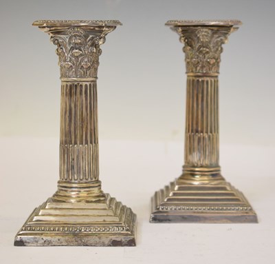 Lot 219 - Pair of Victorian silver candlesticks of fluted Corinthian column form