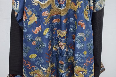 Lot 255 - Fine Chinese embroidered blue silk jifu or dragon robe