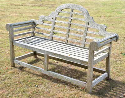 Lot 681 - Teak ‘Lutyens’ style two-seater garden bench