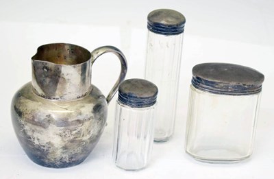 Lot 205 - Gordon Family - Victorian silver jug and three dressing table jars
