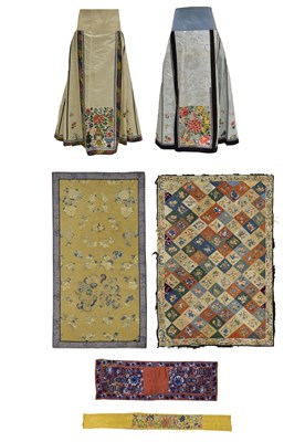 Lot 253 - Two Chinese embroidered silk skirts and four assorted panels