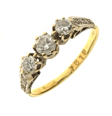 Lot 8 - Diamond yellow gold three-stone diamond ring