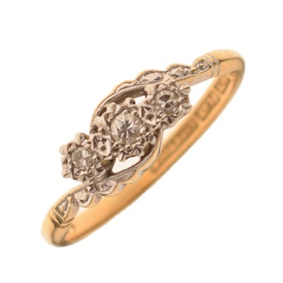 Lot 10 - Illusion set diamond three-stone crossover ring