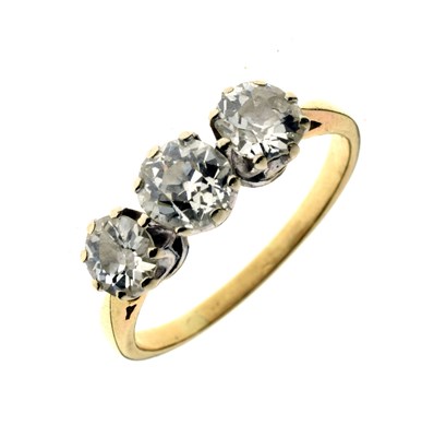 Lot 9 - Diamond 18ct yellow and white gold set three-stone ring