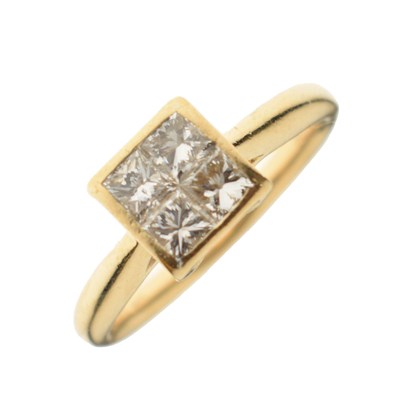 Lot 13 - 18ct gold four-stone diamond ring