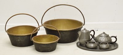 Lot 288 - Graduated set of three brass jam pans