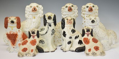 Lot 414 - Two pairs of Staffordshire pottery spaniels, etc