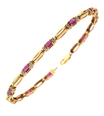 Lot 127 - Ruby and diamond 9ct gold bracelet