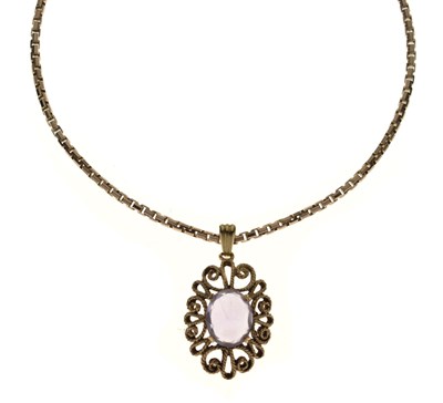 Lot 88 - Late 1970s 9ct gold amethyst wirework pendant and chain