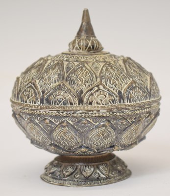 Lot 226 - Thai white metal pedestal pot and cover with lotus leaf decoration