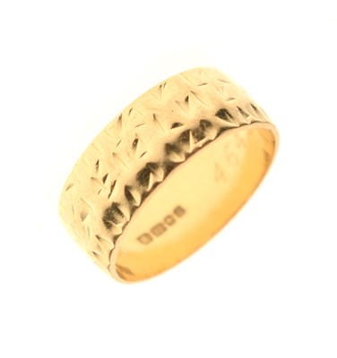 Lot 64 - 18ct gold textured wedding band