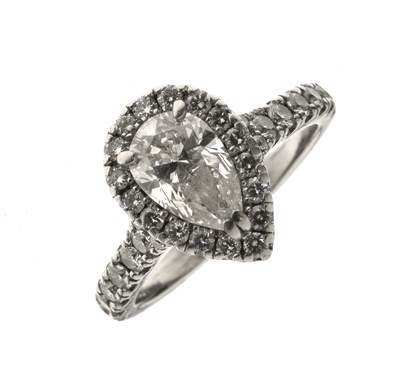 Lot 6 - Diamond pear shaped platinum halo ring with certificate