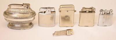 Lot 270 - Ronson 'Queen Anne' table lighter, four lighters, and a cigar cutter