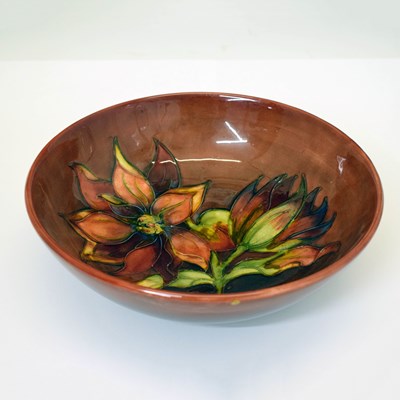 Lot 433 - Moorcroft - Walter Moorcroft flambé footed bowl
