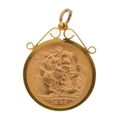 Lot 229 - Elizabeth II gold sovereign, 1966, in 9ct gold scroll frame