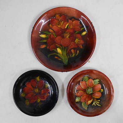 Lot 446 - Three Moorcroft flambé plates