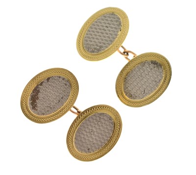 Lot 143 - Cased pair of 1950s yellow and white metal cufflinks