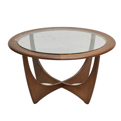 Lot 603 - Attributed to G-Plan - Teak and glass oval 'Astro' circular coffee table