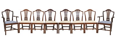 Lot 657 - Six late George III mahogany shield-back dining chairs