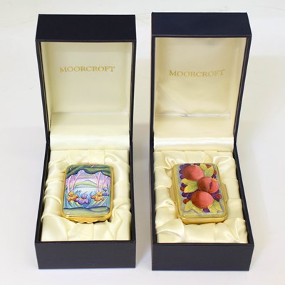 Lot 452 - Moorcroft - Two miniature enamel rectangular boxes with hinged covers