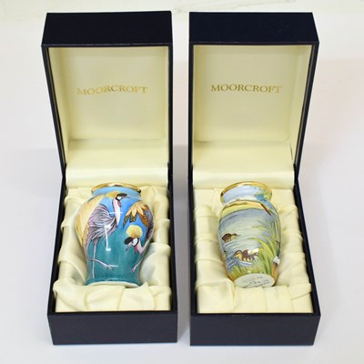 Lot 455 - Moorcroft - Two miniature enamel vases