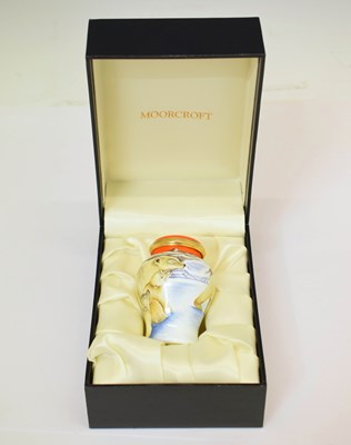 Lot 458 - Moorcroft - Miniature enamel baluster vase and cover decorated in the 'Making tracks' pattern