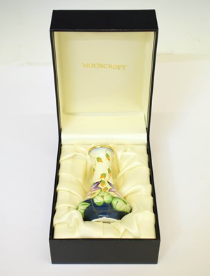Lot 459 - Moorcroft - Miniature enamel vase of conical form with waisted neck