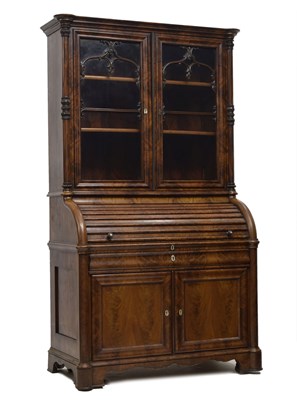 Lot 453 - Mid-19th century Continental flame figured mahogany cylinder bureau bookcase