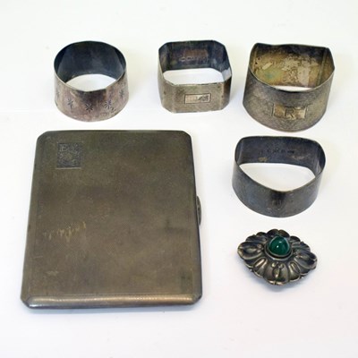 Lot 303 - George VI silver cigarette case, four Elizabeth II silver napkin rings and silver brooch