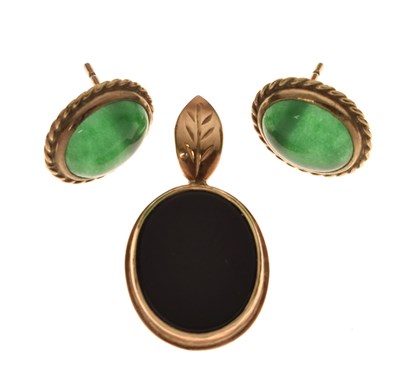 Lot 128 - Chinese yellow metal and onyx pendant stamped 14k, with a pair of jade yellow metal earrings (2)