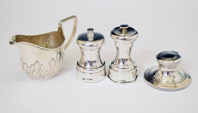 Lot 298 - Edward VII pepper mill, Elizabeth II pepper mill, George V silver inkwell and a cream jug