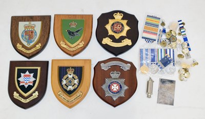 Lot 348 - Collection of wall mounted shields and police miscellaneous