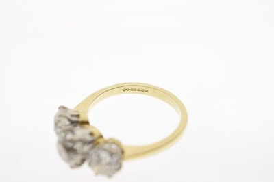 Lot 7 - Diamond three stone 18ct yellow and white gold set ring