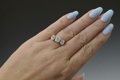 Lot 7 - Diamond three stone 18ct yellow and white gold set ring