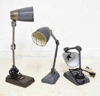 Lot 646 - Three mid century retro industrial Anglepoise style desk lamps
