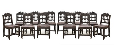 Lot 449 - Set of twelve early 20th century carved oak dining chairs