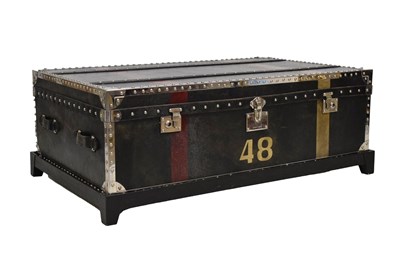 Lot 647 - Andrew Martin - Leather and studded metal 'coffee table' trunk on stand
