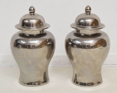 Lot 493 - Pair silvered ceramic urns and covers