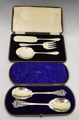 Lot 313 - Cased pair of George V silver salad servers together with a cased desert service
