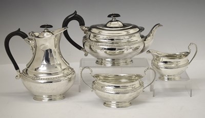 Lot 132 - George V silver four-piece tea set