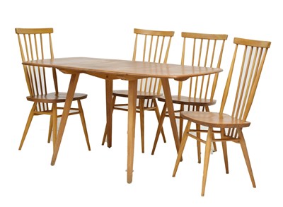Lot 648 - Ercol - Elm drop leaf table and four model 608 stick back chairs