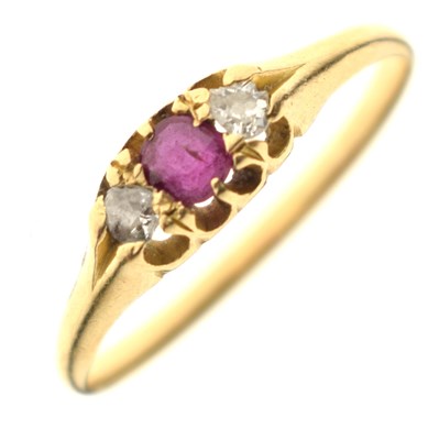 Lot 83 - Late Victorian / Edwardian ruby and diamond three-stone yellow metal ring