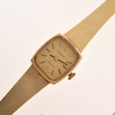 Lot 243 - Memphis - Lady's 14k gold bracelet watch