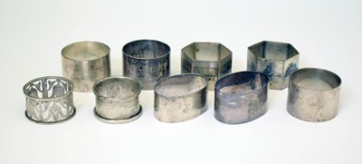 Lot 286 - Seven silver napkin rings together with a pair of white metal Egyptian niello napkin rings
